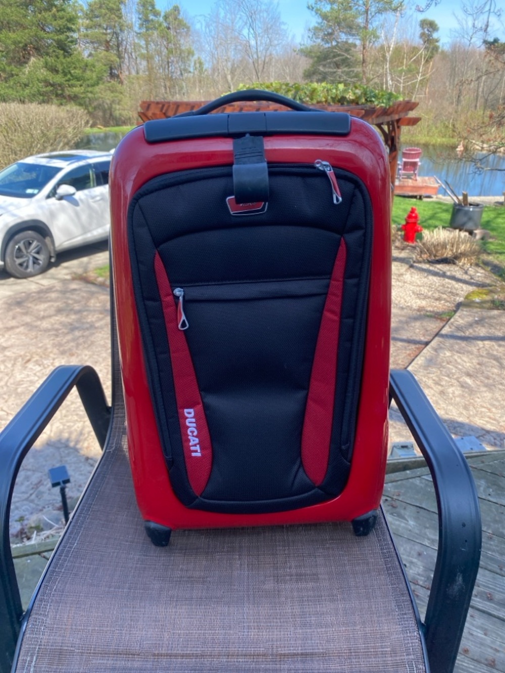 Tumi Ducati Bright Red Hardshell Carry-On Spinner 425 for both